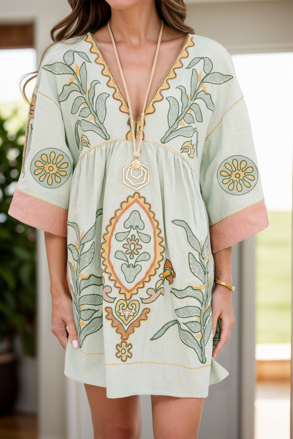 The Isadora Three-Quarter Sleeve Mini Dress